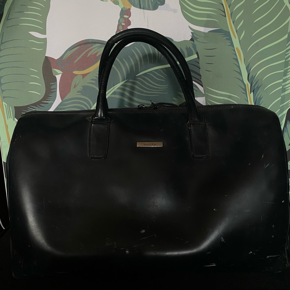 Vintage Gucci overnight black bag.